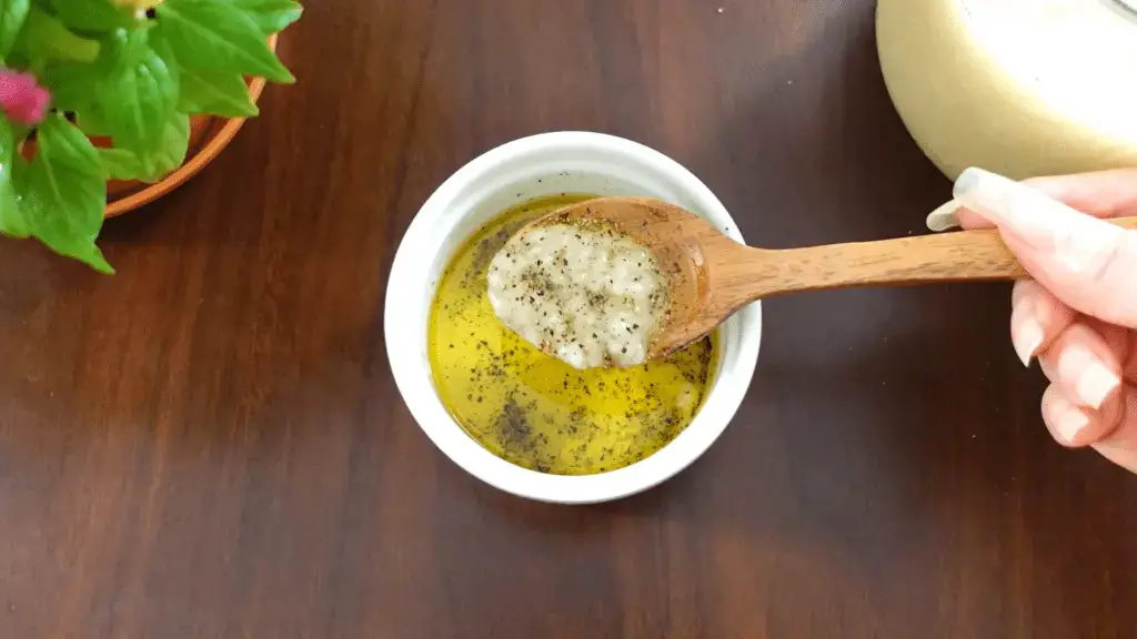 Shio koji dressing scooped with a spoon