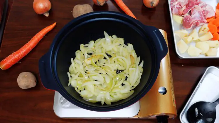 Fry sliced onion on low to medium heat