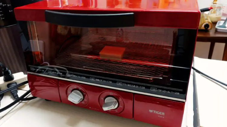 Pop rice cake mochi into a toaster and bake it