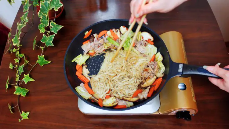separate the noodles on the pan