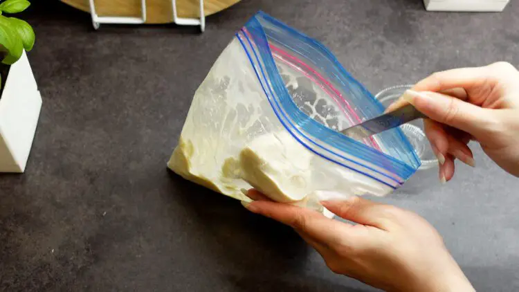 open up the bag and scoop up the ice cream