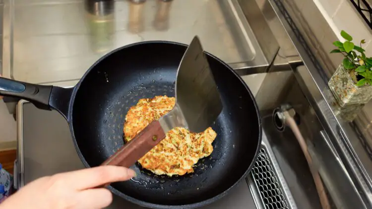once it's golden brown, use a large spatula to flip it over