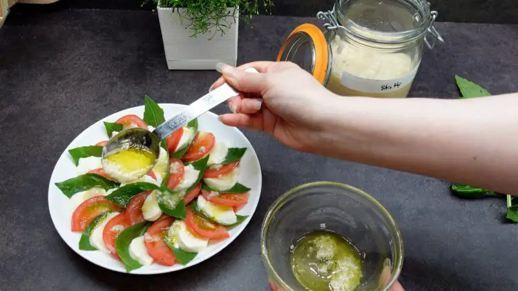 Stir this mixture and then pour it over the salad