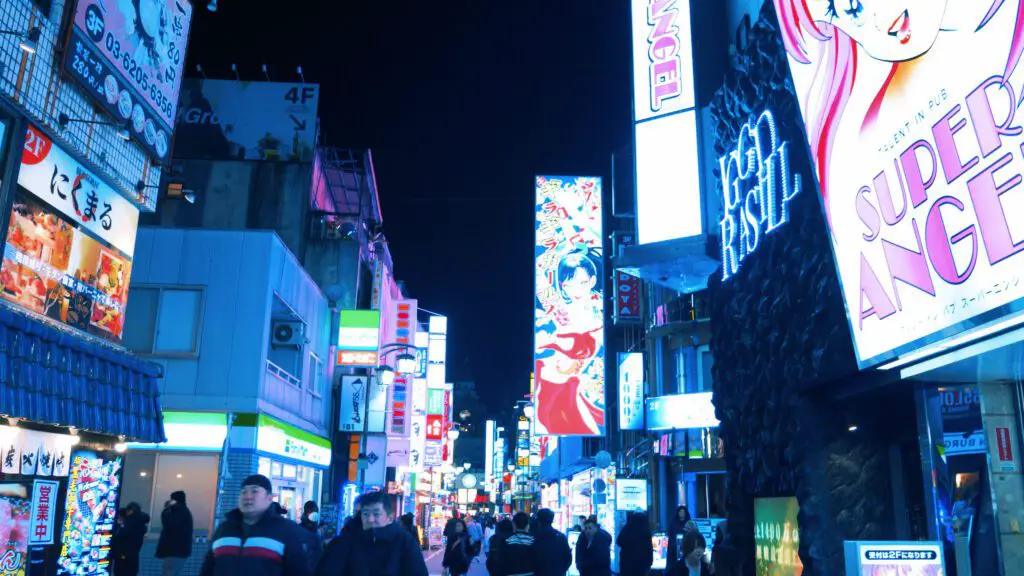 tokyo street with manga girl signs