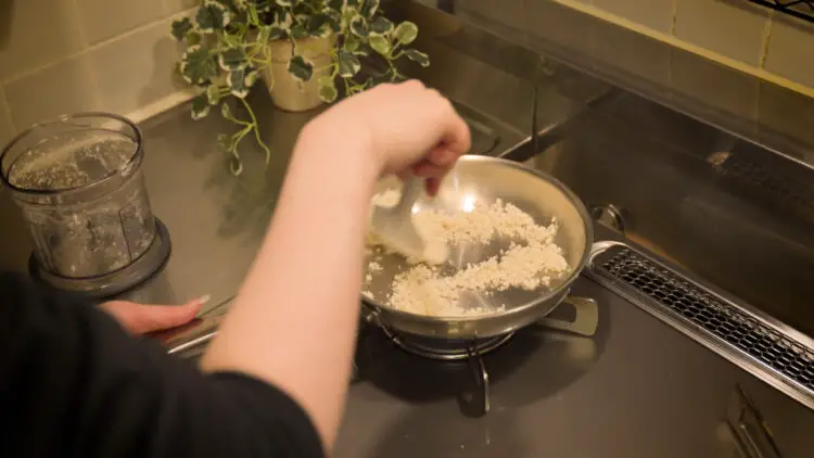 cook ground cauliflower florets in a pan