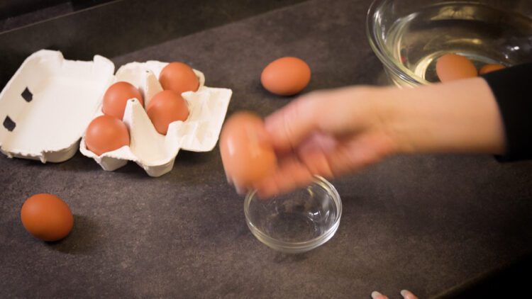hold the egg in your hand and gently shake it