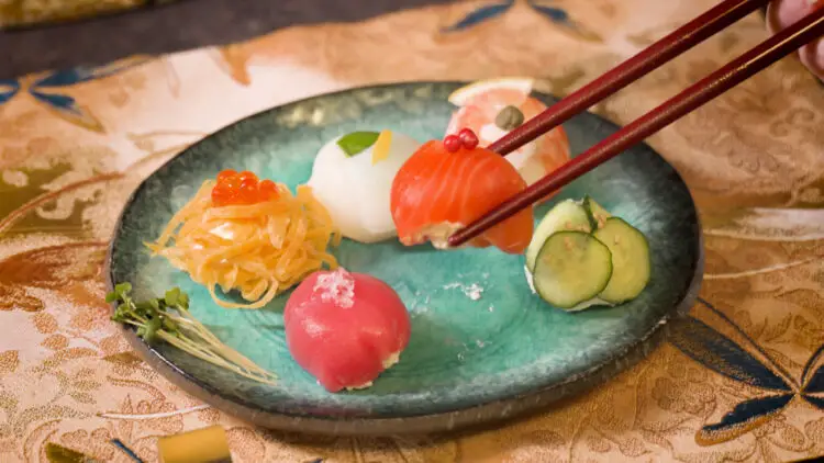 Keto Sushi picked up with chopsticks