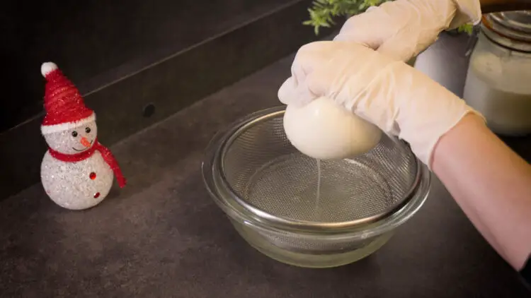 squeeze out more whey from the kefir cheese