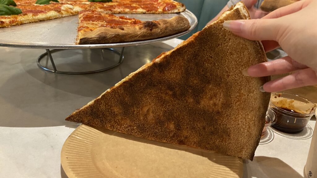 Bottom of a pepperoni slice