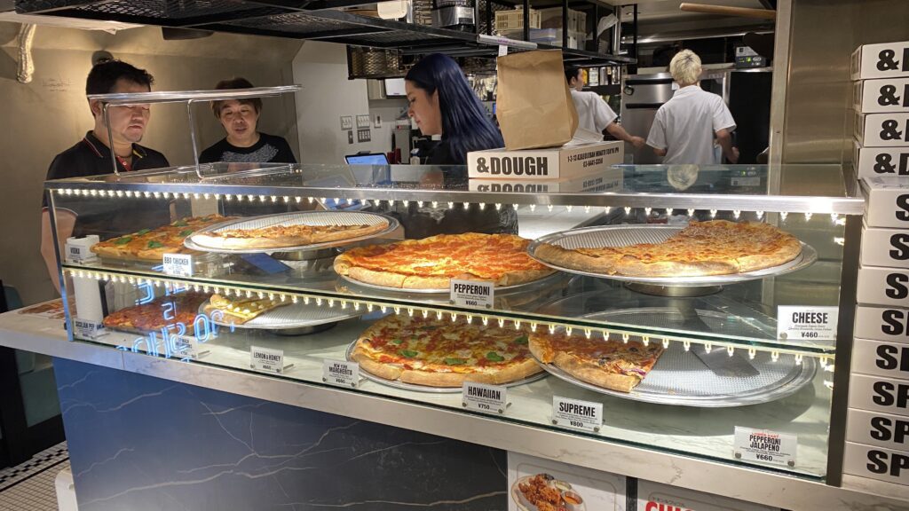 Display of different pizzas inside Nim's Pizza