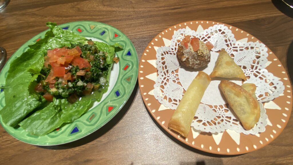 Tabbouleh Salad (left) and Small Mezze Plate (right) - Each one in the Mezze Plate was distinct and mind-blowing!