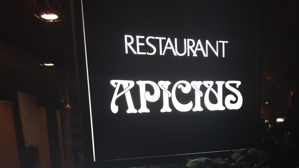 Apicius entrance sign board