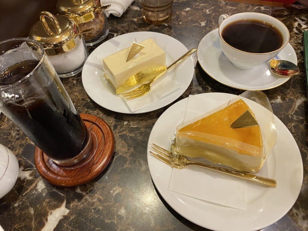 cakes and two coffee at our table